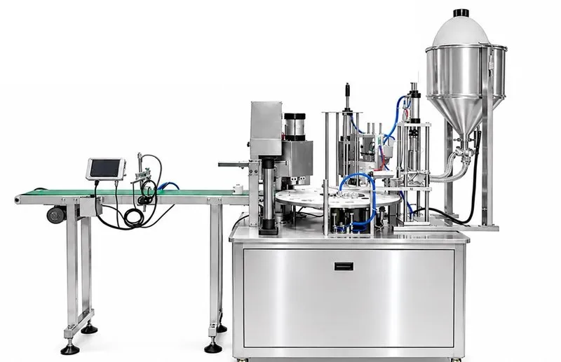 Rotary cup filling and sealing machine with hopper and infeed conveyor